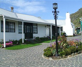 Touchwood Cottages & Craft Gallery & Cafe - Airlie Beach Holiday 0