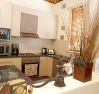 Anderl's Beach Cottage - Airlie Beach Holiday