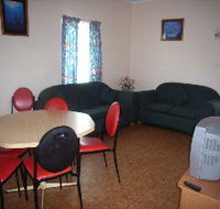Alonga Waterfront Cottages - Airlie Beach Holiday