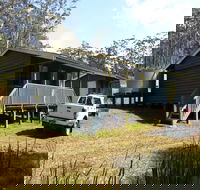 Daisy Plains huts - Airlie Beach Holiday