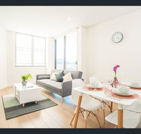 Gorgeous modern brand new two bedroom apartment with large lounge and private garden view balcony - Airlie Beach Holiday