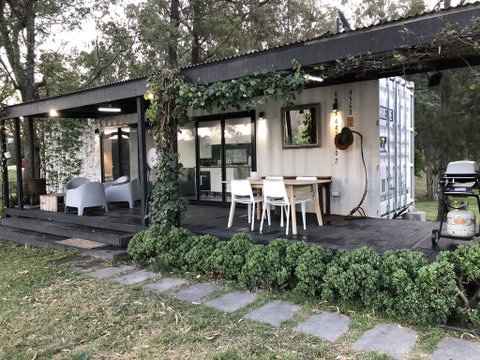 Absolute Riverfront Shipping Container Cabin - Airlie Beach Holiday 0