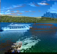 The Original Day Tour to Paronella Park Lake Barrine and Millaa Millaa Falls - Airlie Beach Holiday